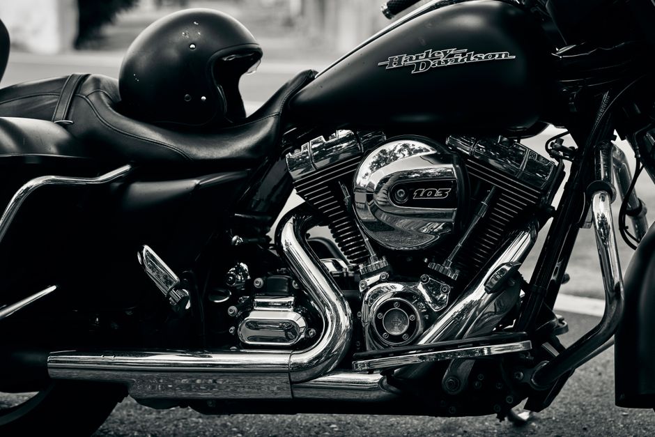 Detailed view of a Harley Davidson motorcycle showing its engine and chrome details.